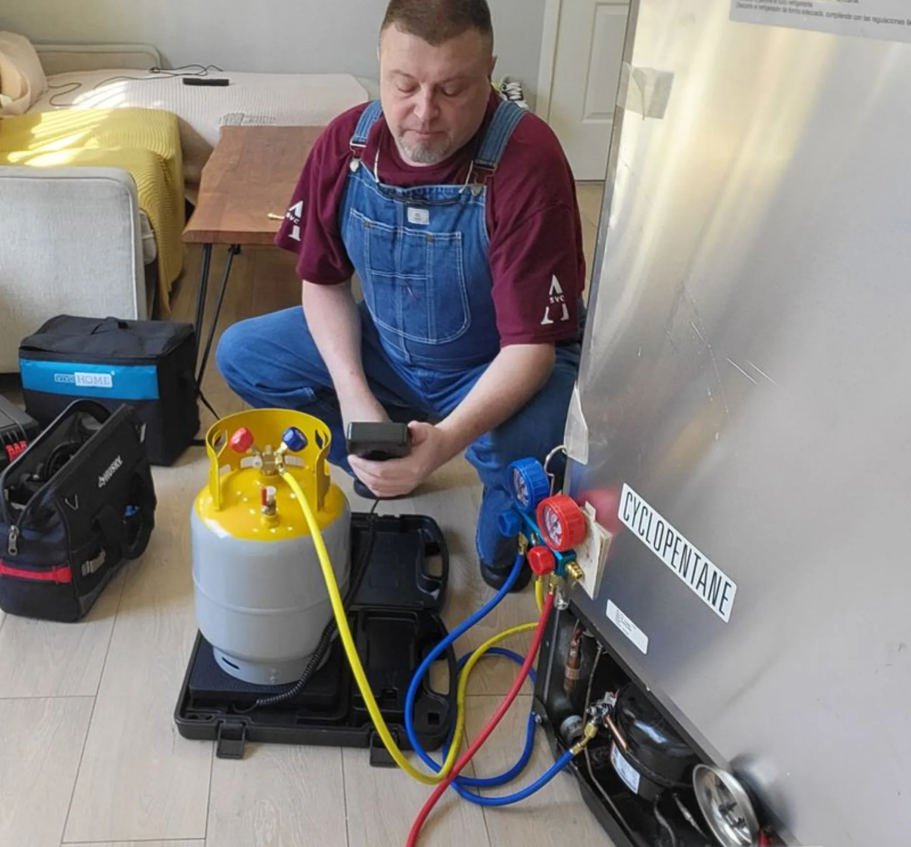 Expert technician performing Sub-Zero refrigerant repair